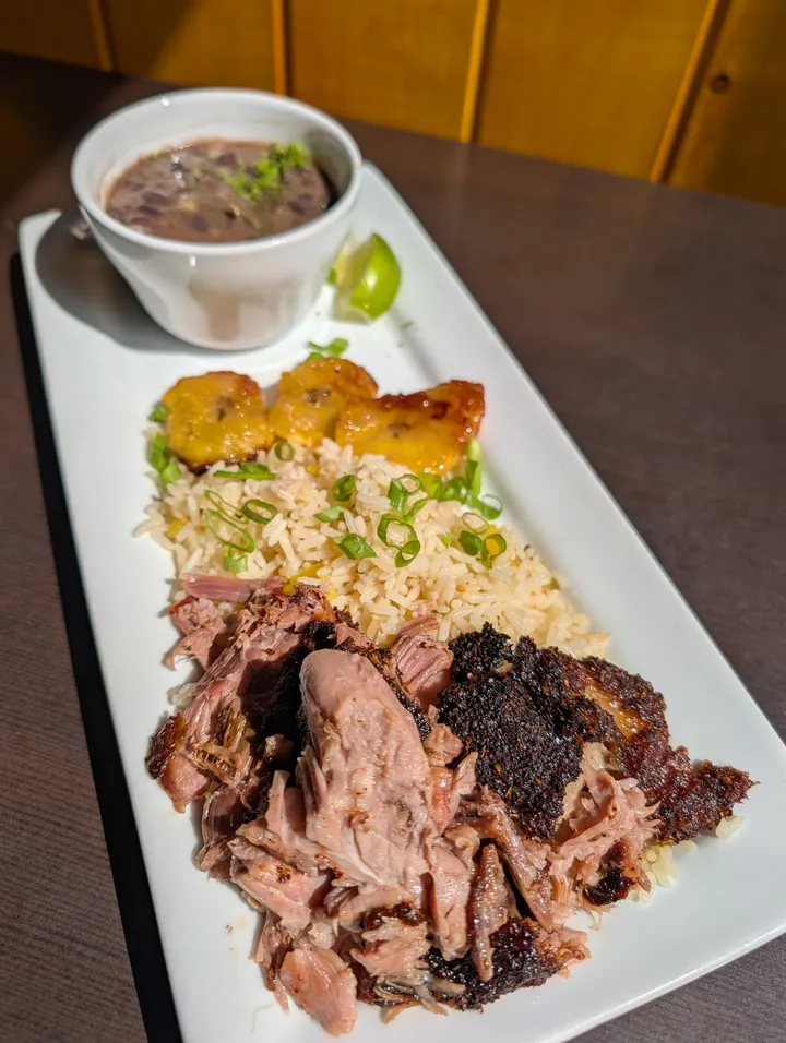 Mojo pulled pork with rice, sweet plantains, and black beans